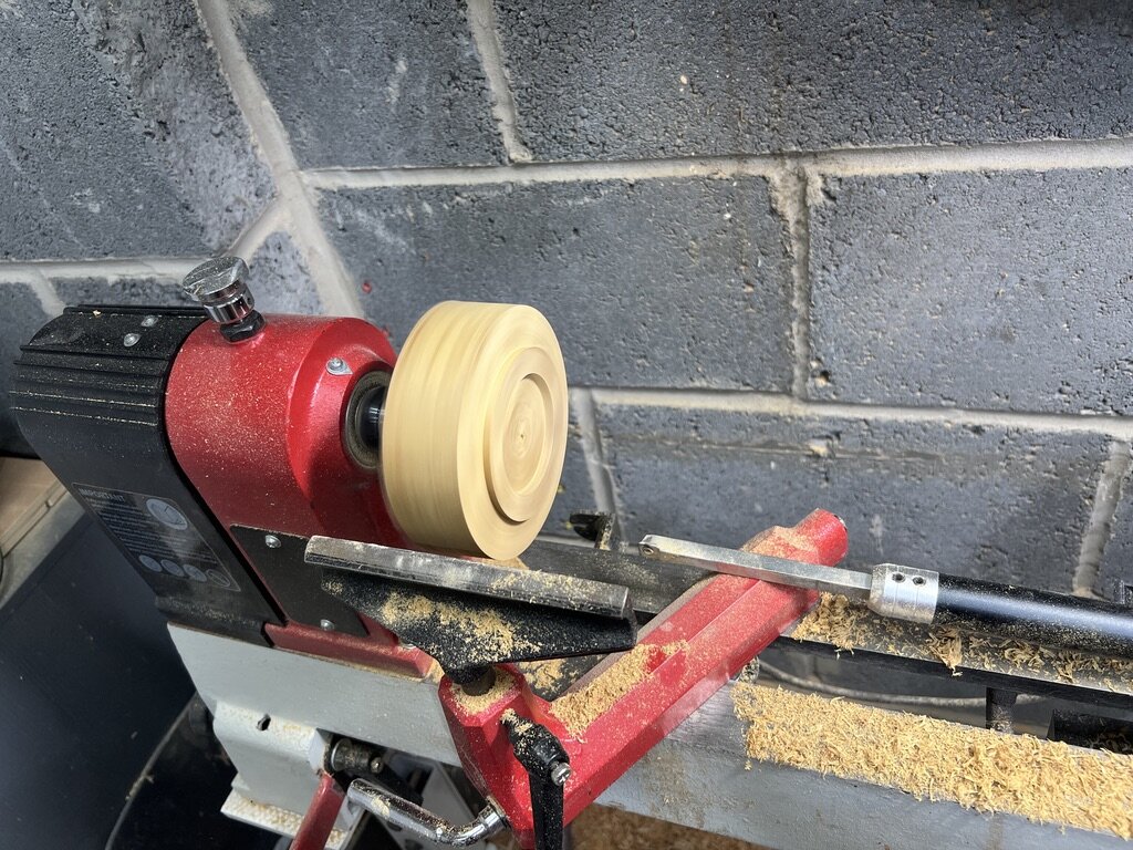 A mortise being turned into the foot of the bowl